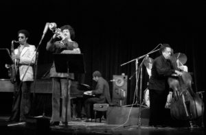 Charles Mingus, Ricky Ford, Jack Walrath, Bob Neloms, and Charles Mingus- Photo by Uberto Sagramoso.